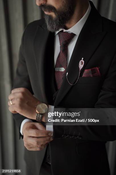 midsection of man wearing suit - editorial stock pictures, royalty-free photos & images
