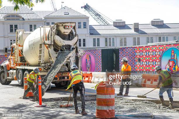 Construction workers repairing road, Manhattan, New York City, New York, USA.