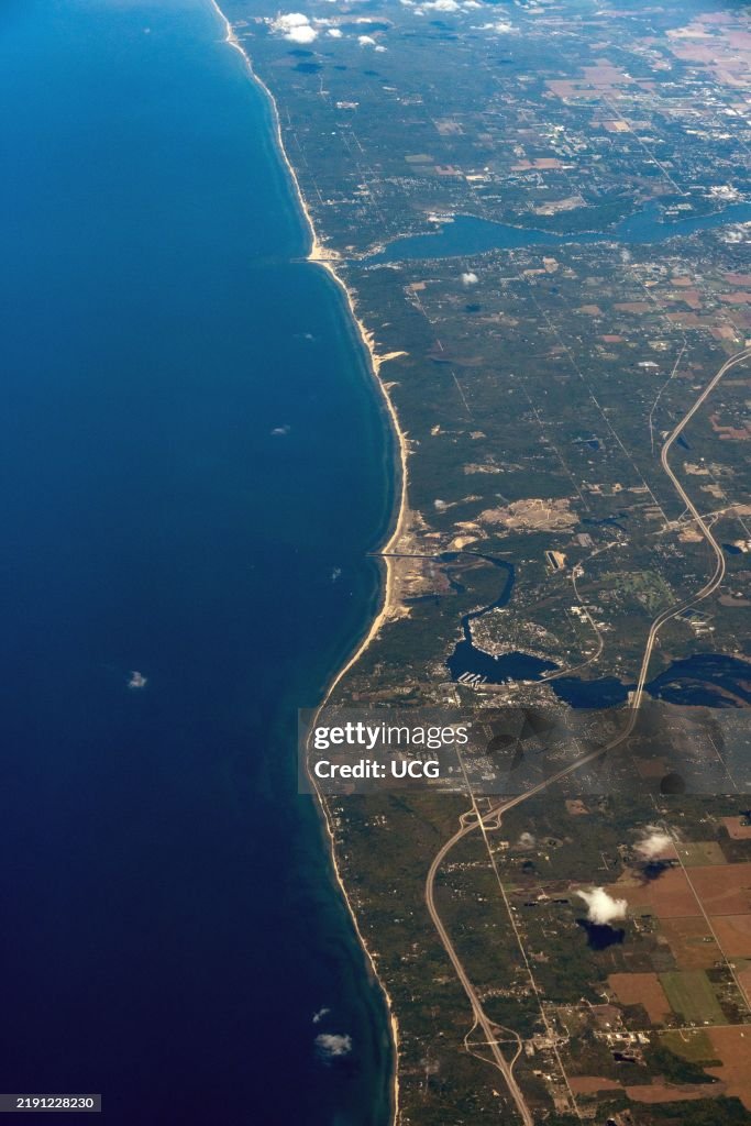 View north along the east shore of Lake Michigan over the town of Saugatuck, Michigan