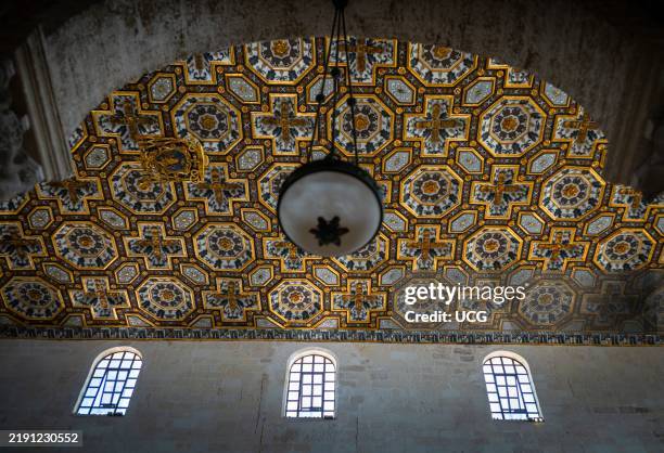 The 17th century wooden coffered ceiling in Otranto Cathedral, Apulia, Italy. It is divided into panels with each containing intricate decorative...