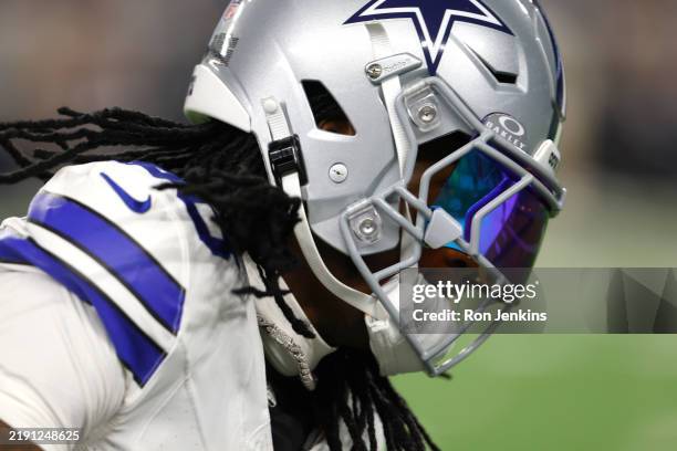 CeeDee Lamb of the Dallas Cowboys warms up before the game between the Dallas Cowboys and the Tampa Bay Buccaneers at AT&T Stadium on December 22,...