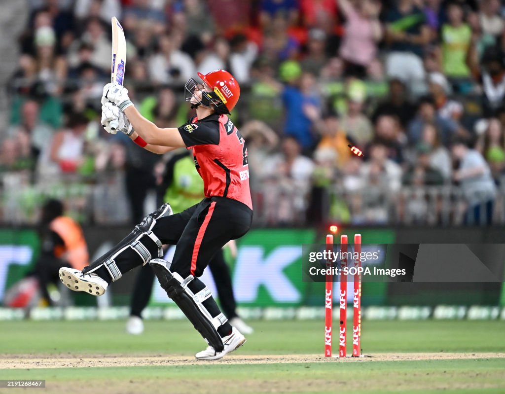 Jacob Bethell of Melbourne Renegades is bowled out by Daniel...