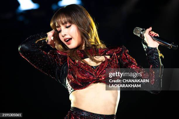 Thai rapper and singer Lisa, from South Korean group Blackpink, performs during the New Year's Eve celebrations in Bangkok on December 31, 2024.