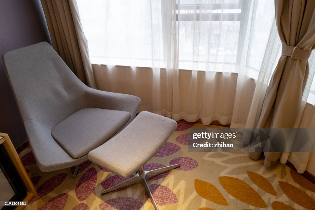 A chair by the window