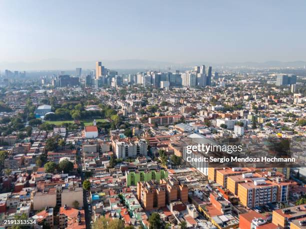aerial view of sprawling western mexico city on a sunny day - mexico city, mexico - cidade do méxico imagens e fotografias de stock