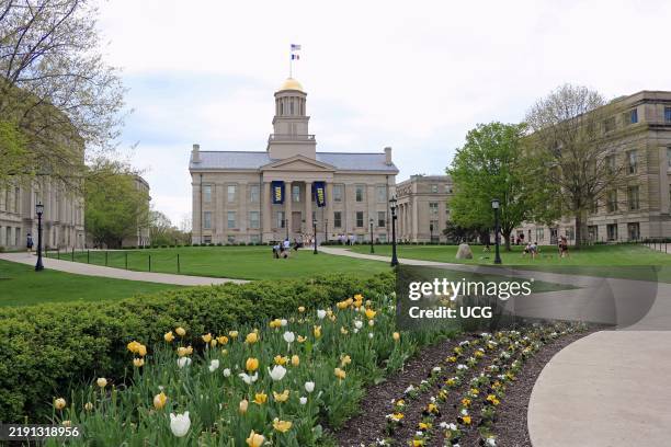 University of Iowa spring campus scene in Iowa City. The University of Iowa is a public state university in Iowa City, Iowa, offering teaching and...