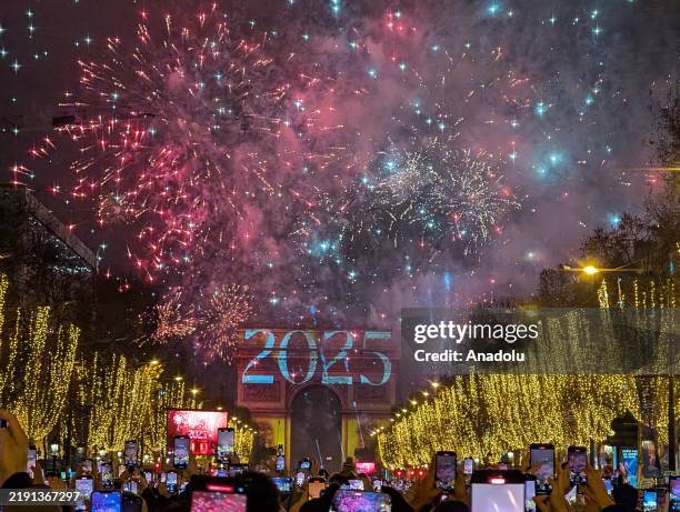 Fireworks and light shows are held at the Champs-Elysees during the New Year celebrations in Paris, France on January 1, 2025.