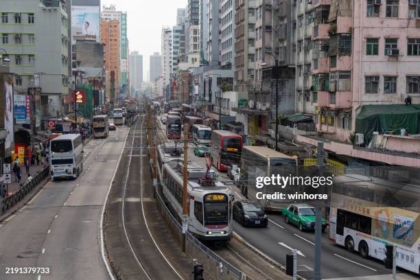 castle peak road - yuen long in new territories, hong kong - district yuen long stockfoto's en -beelden