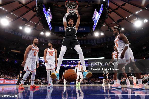 Victor Wembanyama of the San Antonio Spurs dunks the ball against the New York Knicks during the second quarter at Madison Square Garden on December...