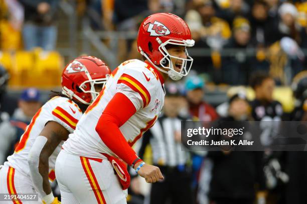 Patrick Mahomes of the Kansas City Chiefs prepares to snap the ball during the second quarter against the Pittsburgh Steelers at Acrisure Stadium on...