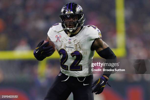 Running back Derrick Henry of the Baltimore Ravens carries the ball during the second half of an NFL football game against the Houston Texans, at NRG...