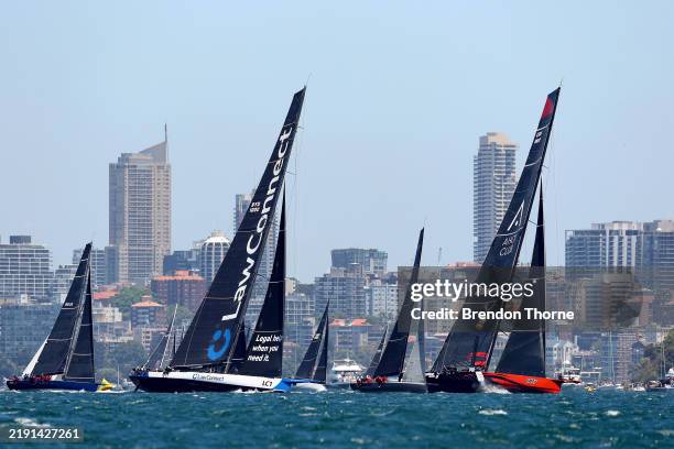 LawConnect and Master Lock Comanche sail towards Sydney head during the start of the 2025 Sydney to Hobart on Sydney Harbour on December 26, 2024 in...