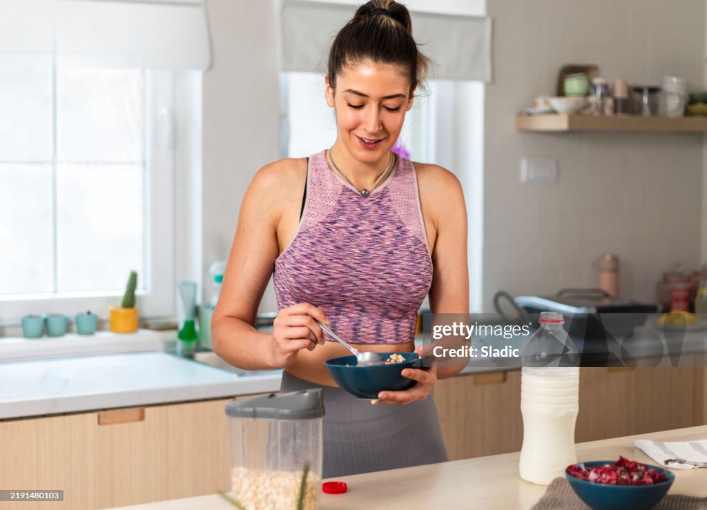 Woman preparing healthy dieting vegetarian nutritious breakfast.