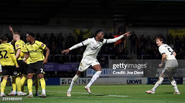 Emmanuel Fernandez of Peterborough United celebrates scoring the equalising goal during the Sky Bet League One match between Burton Albion FC and...