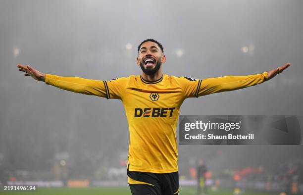 Matheus Cunha of Wolverhampton Wanderers celebrates scoring his team's first goal during the Premier League match between Wolverhampton Wanderers FC...