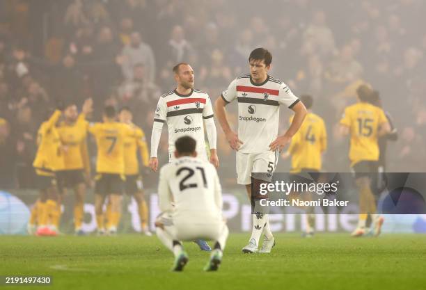 Harry Maguire of Manchester United reacts following Wolverhampton Wanderers' second goal, scored by Hwang Hee-Chan during the Premier League match...