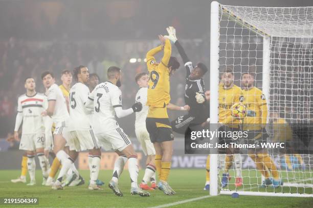 Matheus Cunha of Wolverhampton Wanderers scores his team's first goal from a corner kick during the Premier League match between Wolverhampton...