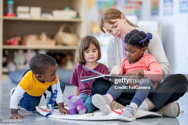 reading together - preschool stock pictures, royalty-free photos & images