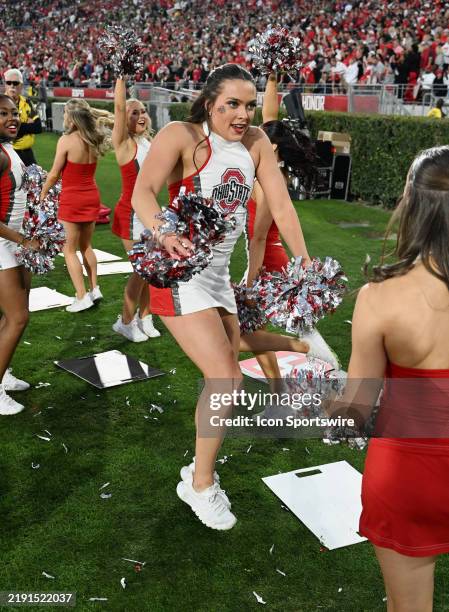 Ohio State Buckeyes cheerleaders dancing on the field in the fourth quarter of a College Football Playoff Quarterfinal against the Oregon Ducks at...