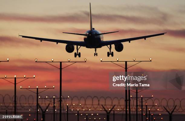 Delta Airlines plane lands at Los Angeles International Airport following the Christmas holiday on December 26, 2024 in Los Angeles, California....