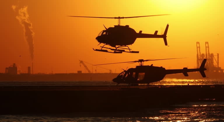 https://media.gettyimages.com/id/2191619306/video/helicopter-sunset-landing.jpg?b=1&s=640x640&k=20&c=Q5CDcxd2KCTe84vYWBpwYH-aNGa5YLFuy1r-ACv9jzw=