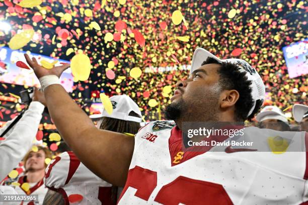 Travis Leonard of the USC Trojans celebrates during the trophy presentation after the SRS Distribution Las Vegas Bowl against the Texas A&M Aggies at...