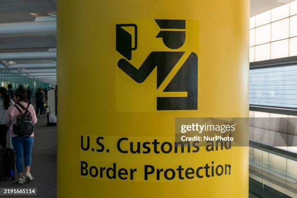 Customs and Border Protection CBP sign, inscription and symbol in yellow background in Newark Liberty International Airport EWR serving the New York...