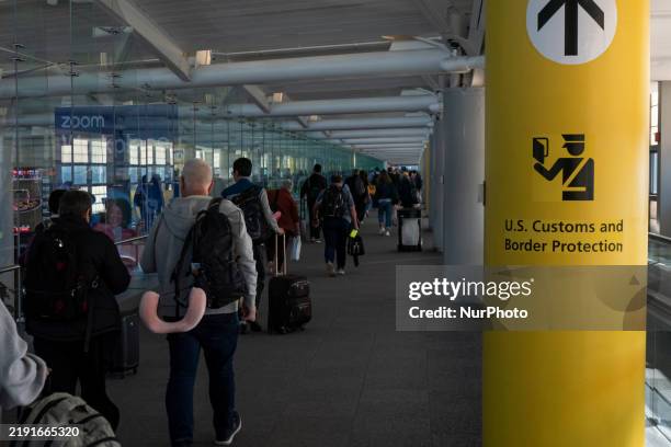 Customs and Border Protection CBP sign, inscription and symbol in yellow background in Newark Liberty International Airport EWR serving the New York...