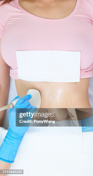 Woman belly ultrasound examination Woman belly ultrasound examination