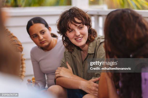 siblings talking - image focus technique stock pictures, royalty-free photos & images