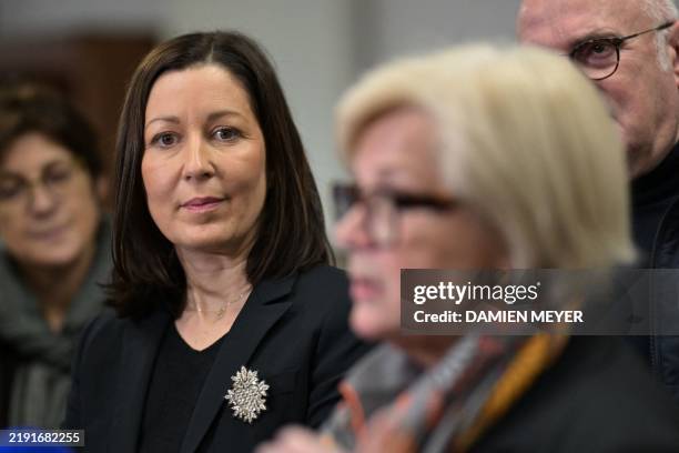 Maine-et-Loire Council president Florence Dabin looks on as France's Minister of Labor, Health, Solidarities and Families Catherine Vautrin speaks to...