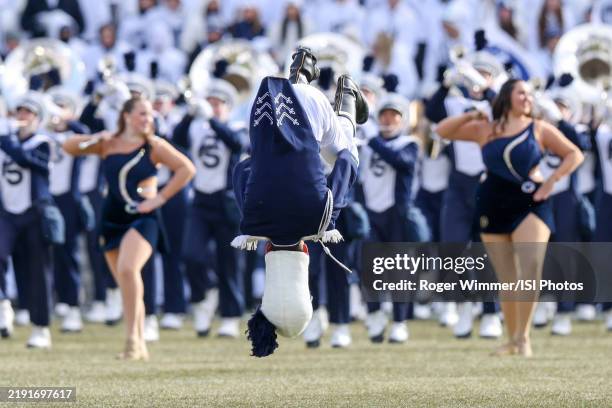 Penn State Drum Major does a front flight before a game between SMU and Penn State at Beaver Stadium on December 21, 2024 in State College,...
