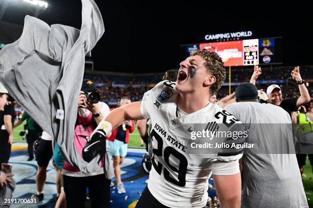 Drew Surges of the Iowa State Cyclones reacts after defeating the Miami Hurricanes 42-41 to win the 2024 Pop-Tarts Bowl at Camping World Stadium on...