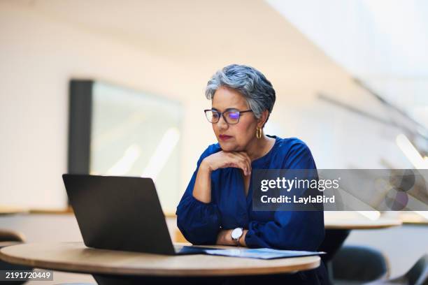 focused professional at work - eyewear stock pictures, royalty-free photos & images