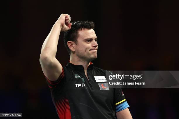 Jeffrey de Graaf of the Netherlands celebrates winning his Third Round Match against Paolo Nebrida of the Philippines on Day Twelve of the 2024/25...