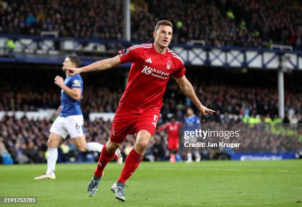 Chris Wood of Nottingham Forest celebrates scoring his team's first goal during the Premier League match between Everton FC and Nottingham Forest FC...
