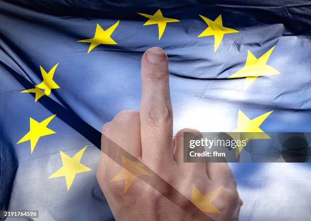 one-finger-salute with eu-flag - meaningful stock pictures, royalty-free photos & images