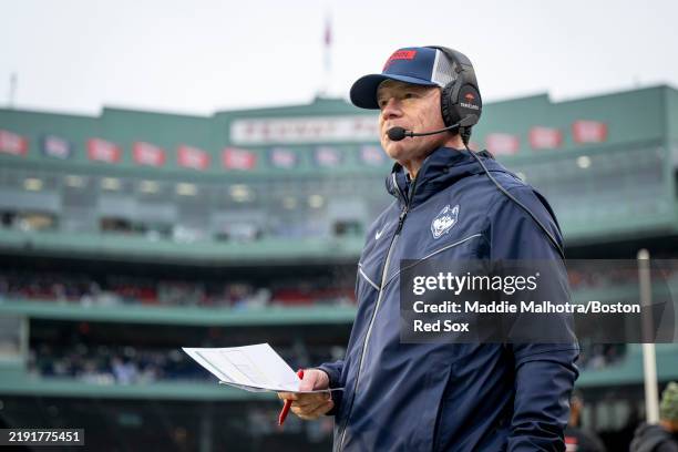 Head Coach Jim Mora of the Connecticut Huskies looks on during the fourth quarter of the 2024 Wasabi Fenway Bowl game against the North Carolina Tar...