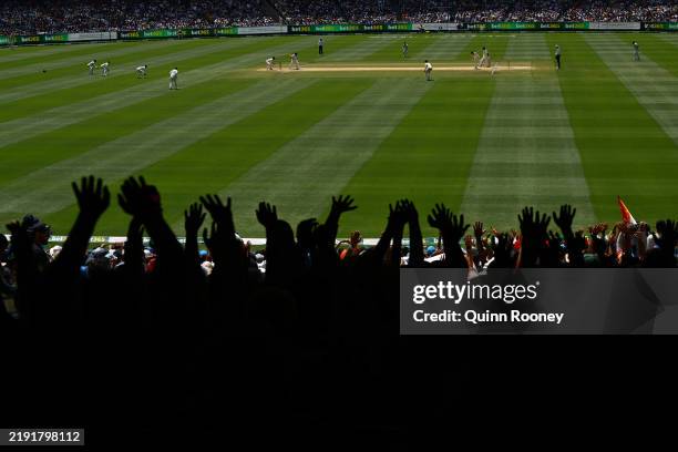 Mitchell Marsh of Australia bowls to Virat Kohli of India during day five of the Men's Fourth Test Match in the series between Australia and India at...