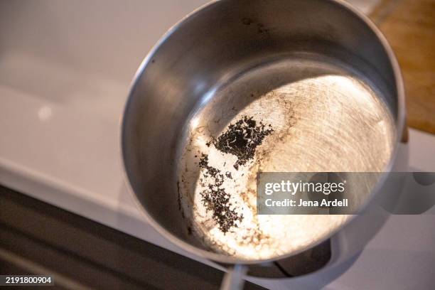 dirty pot, stuck on grease, cleaning dirty pan - burnt stock pictures, royalty-free photos & images