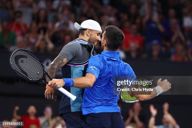 Novak Djokovic and Nick Kyrgios celebrate winning their doubles match against Andreas Mies and Alexander Erler during day two of the 2025 Brisbane...