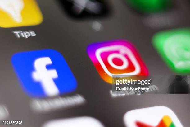 Facebook and Instagram icons are seen displayed on a phone screen in this illustration photo taken in Krakow, Poland on January 4, 2025.