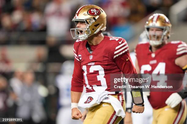 Brock Purdy of the San Francisco 49ers celebrates after his rushing touchdown against the Detroit Lions during the second quarter at Levi's Stadium...