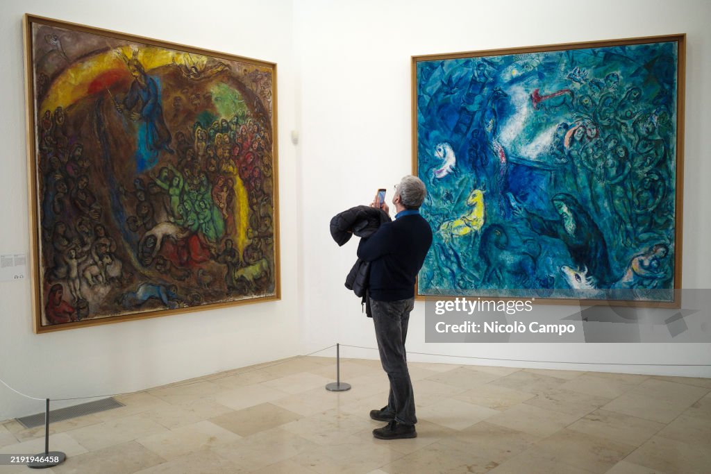 A visitor takes a photo in the Musee National Marc Chagall.