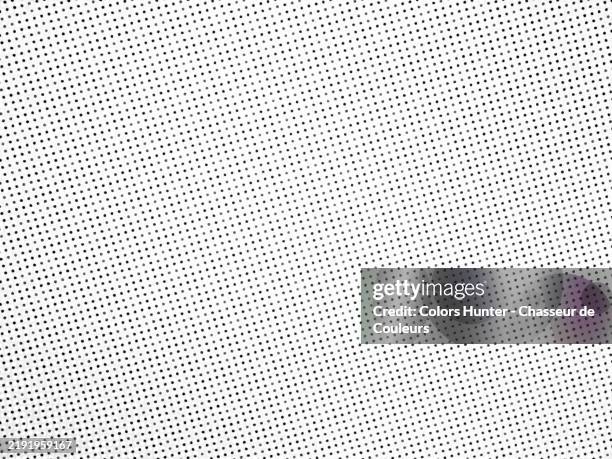 black and gray dots on a white background. macro photography of an offset printed poster. - punktetafel stock-fotos und bilder
