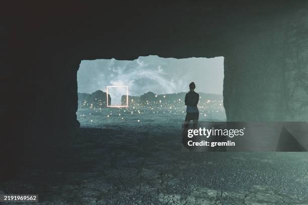 young woman standing in fantasy landscape - woman walking out door silhouette stock pictures, royalty-free photos & images