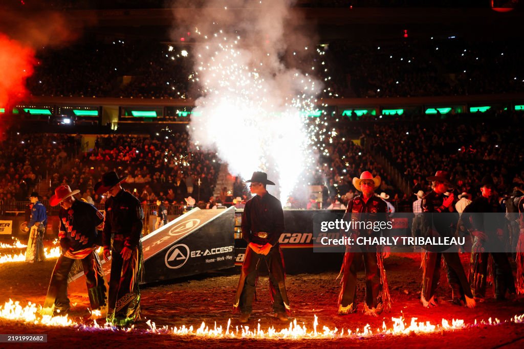 Bull riders enter the arena before competing in the 2025 Professional ...