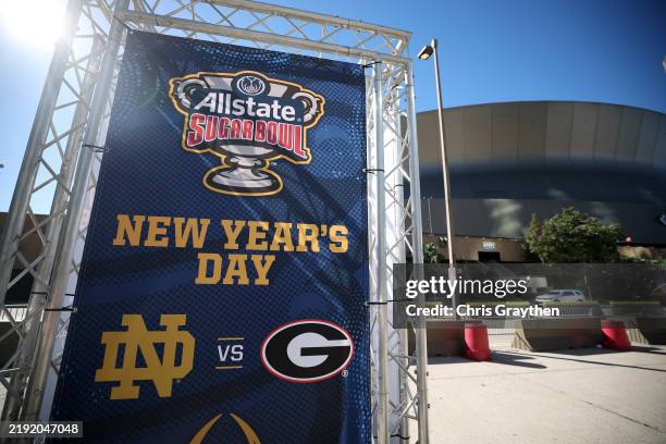 Sign for the Allstate Sugar Bowl between Georgia and Notre Dame is seen outside the Louisiana Superdome after at least ten people were killed on...
