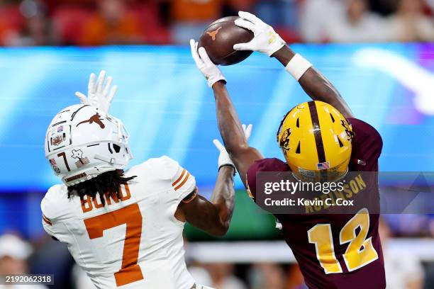 Javan Robinson of the Arizona State Sun Devils intercepts a pass intended for Isaiah Bond of the Texas Longhorns during the fourth quarter in the...