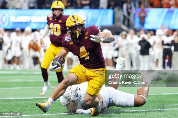 Cam Skattebo of the Arizona State Sun Devils runs the ball for a 2-point conversion during the fourth quarter against the Texas Longhorns in the...